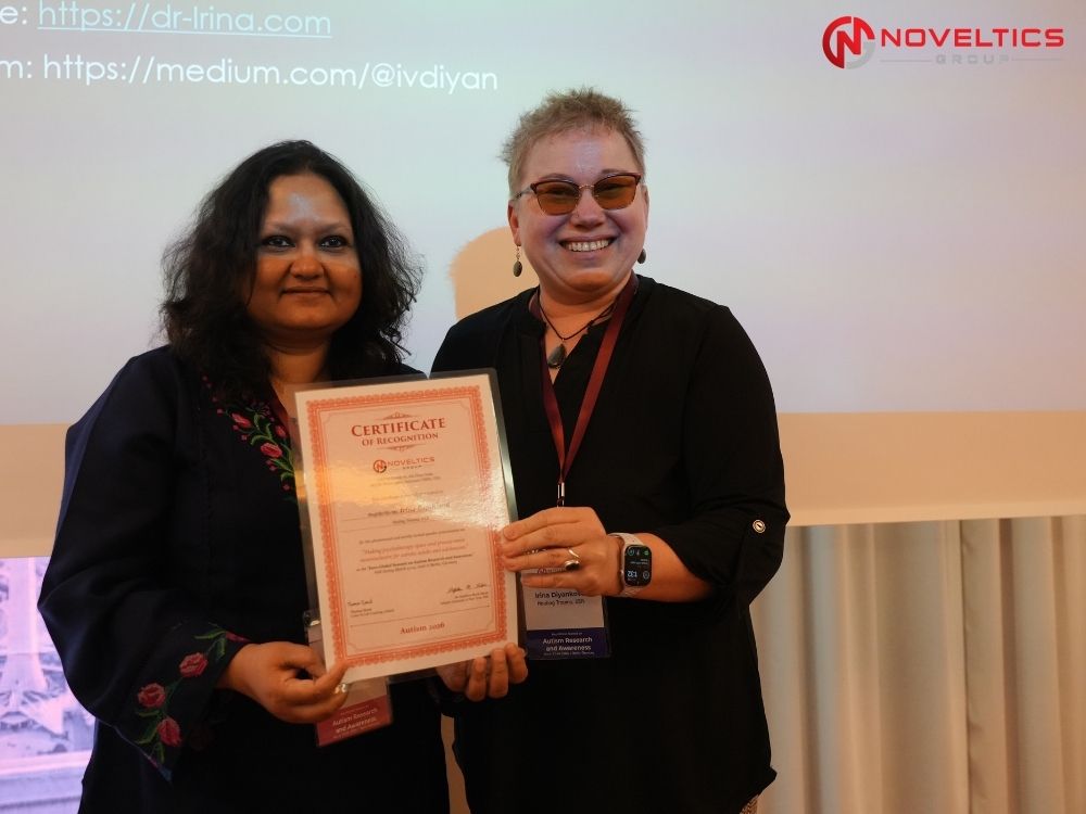 Speaker Irina Diyankova certificate presentation at autism research noveltics