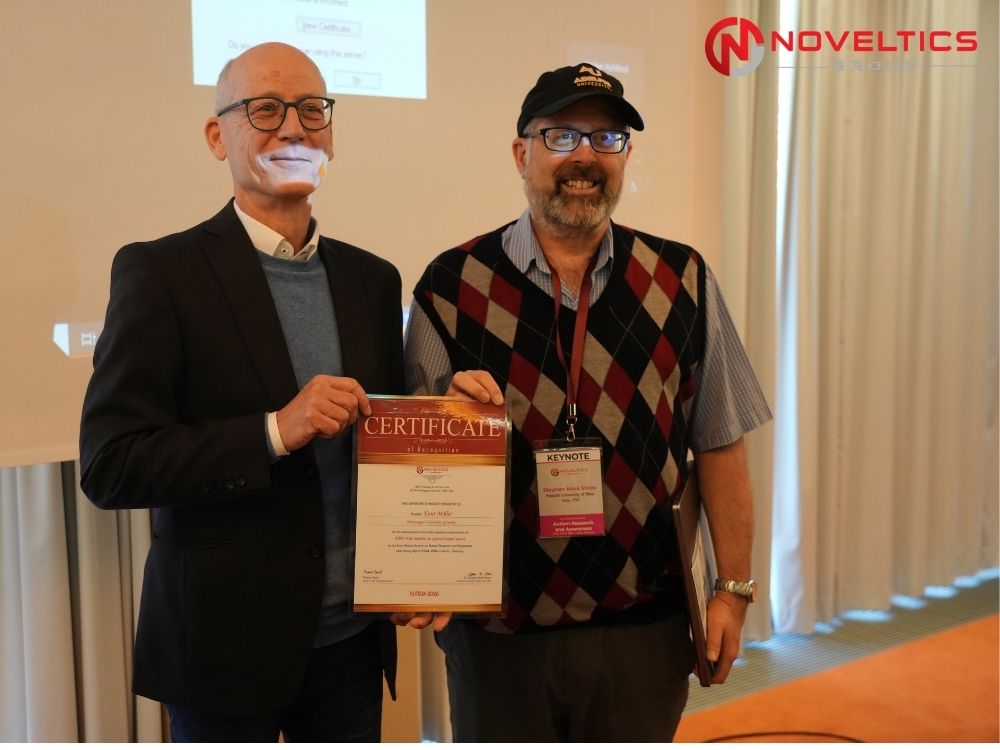 Keynote speaker knut moeller certificate presentation at autism research conference noveltics