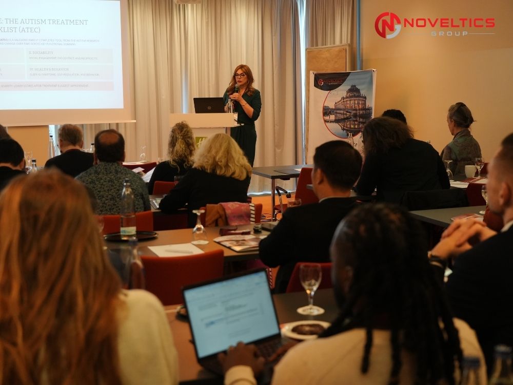 Keynote speaker Magdalena Cubala Kucharska presenting at autism research conference noveltics