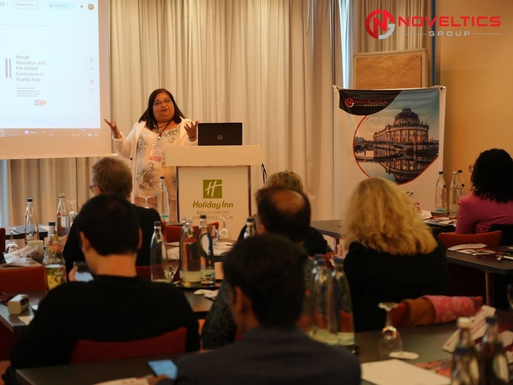 Speaker Yamilka Schumacker Robles presenting findings in scientific session at Autism 2026