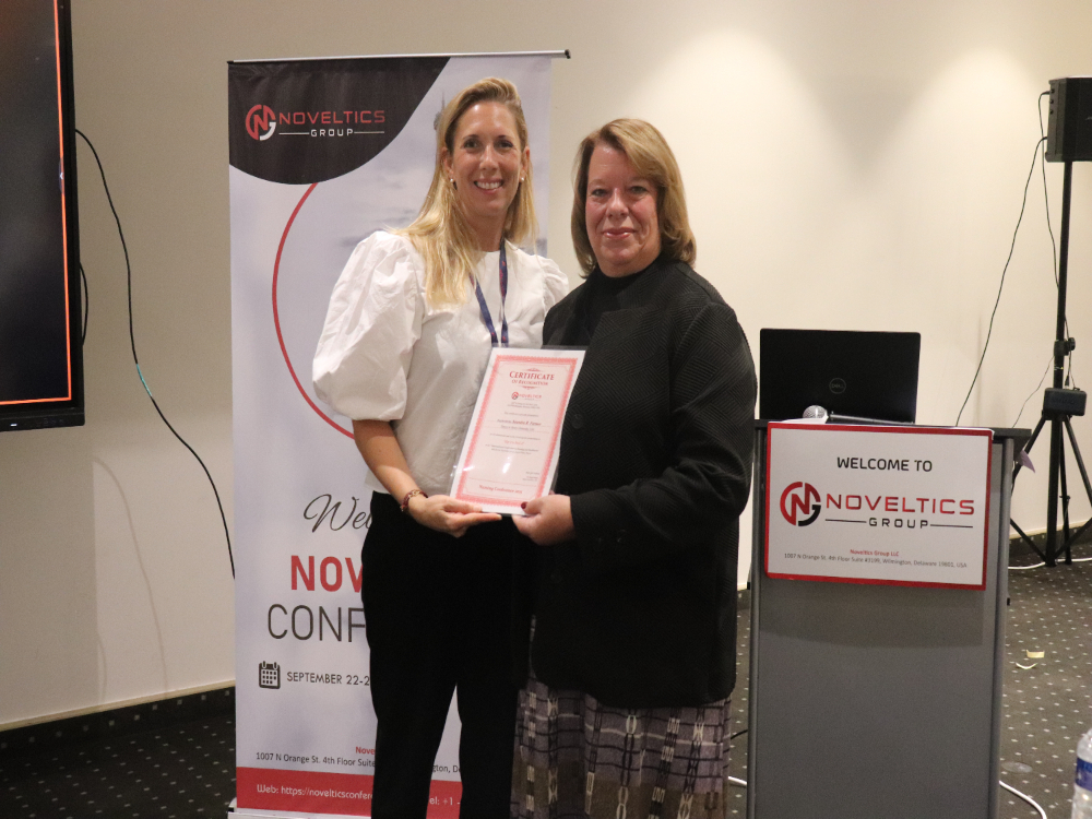 Nursing-Conference-2025-Speaker-Receiving-Certificate-Session-Noveltics-Group